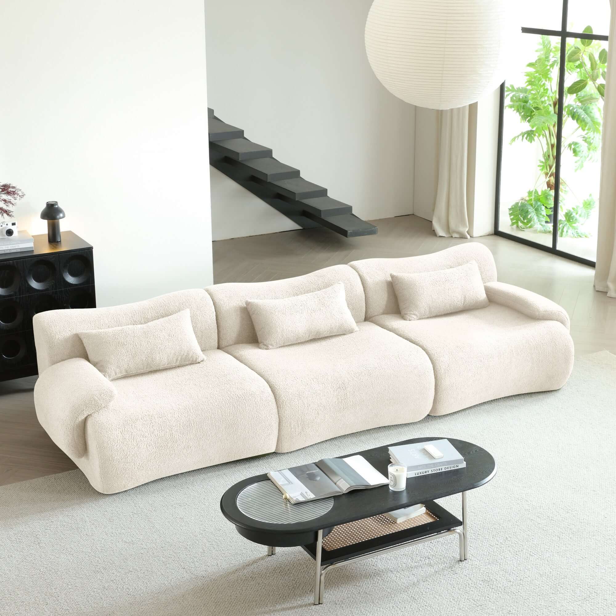 Modern sectional sofa upholstered in soft teddy velvet fabric with modular design