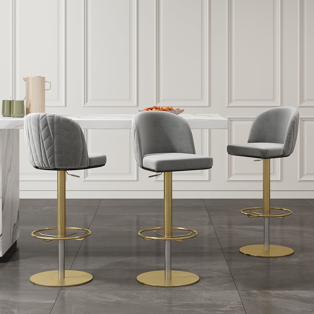 Gray velvet swivel bar stool with curved back and adjustable height, perfect for kitchen or bar seating