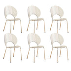Stackable Scandinavian style dining chair with plastic seat, acrylic back, and silver legs