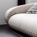 Beige 3-seater microfiber leather sofa bed in Nordic style with versatile design