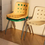 Stackable Scandinavian plastic and acrylic side chair with low back for dining
