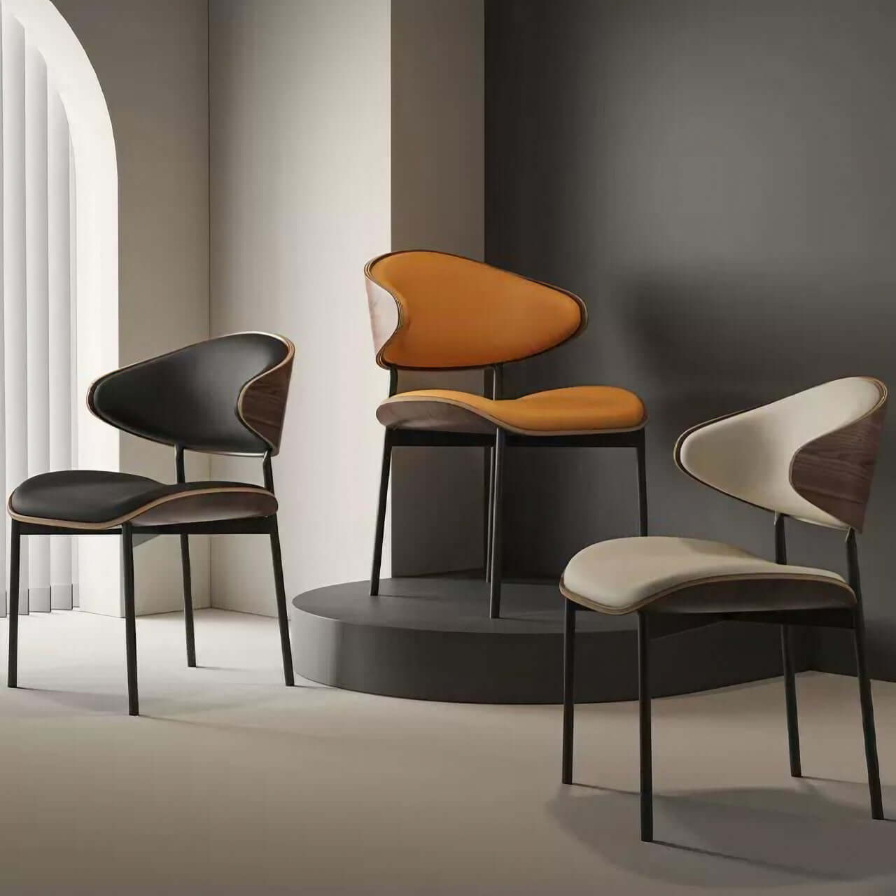 Black leather single dining chair with curved back, durable and minimalist luxury design main product image Main image