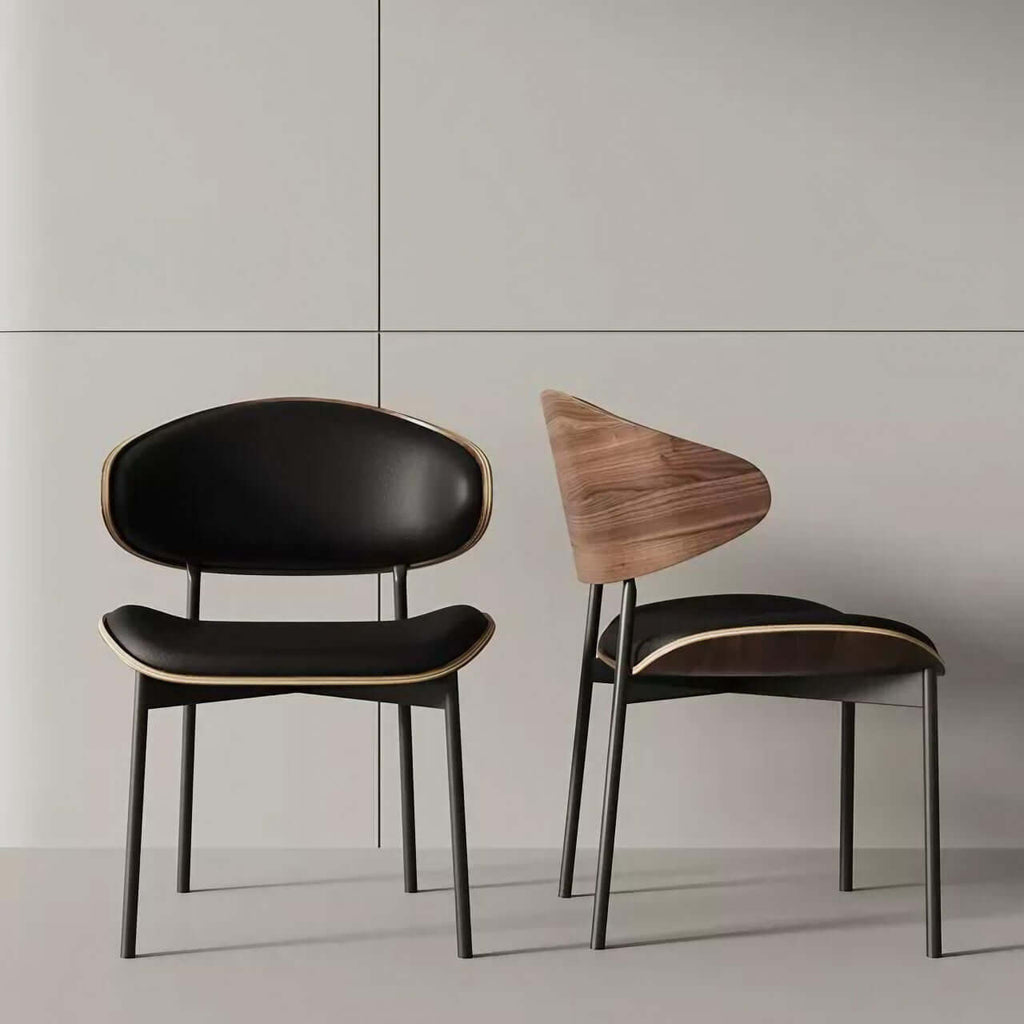 Black leather single dining chair with curved back, durable and minimalist luxury design