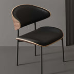 Black leather single dining chair with curved back, durable and minimalist luxury design