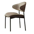 Black leather single dining chair with curved back, durable and minimalist luxury design