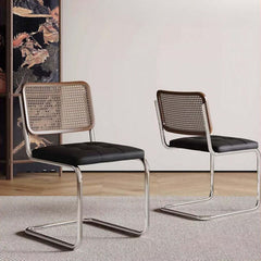 Elegant single retro chair with black PU leather and rattan design