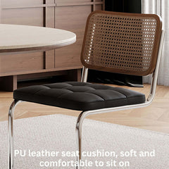 Elegant single retro chair with black PU leather and rattan design