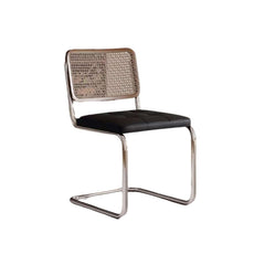 Retro-inspired black chair with PU leather seat and woven rattan back