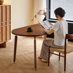 Black Walnut Dining Table with Hand-Matched Inlay and Oval Form