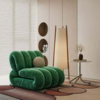 Single leisure chair in blue frosted velvet with a creative lazy sofa design