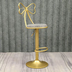 Bow Back Glam Upholstered Bar Stool with Gold Pedestal and Footrest