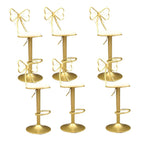 Bow Back Glam Upholstered Bar Stool with Gold Pedestal and Footrest