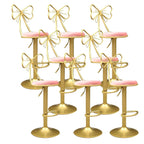Bow Back Glam Upholstered Bar Stool with Gold Pedestal and Footrest