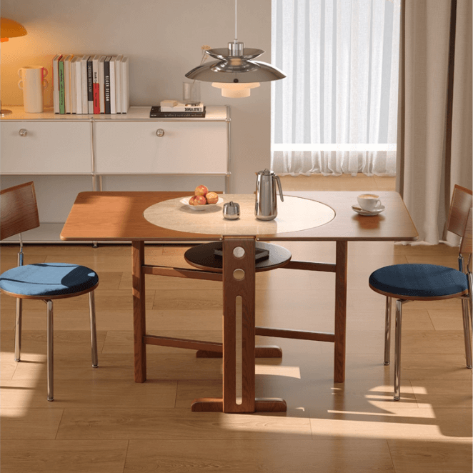 Extendable round sintered stone dining table with drop leaf