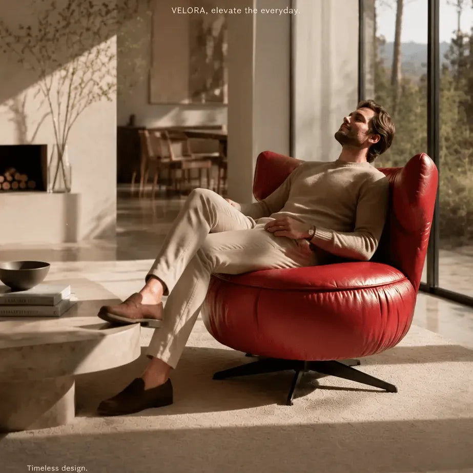 Burgundy Leather Lounge Chair with Sculpted Wing Back and Swivel Base