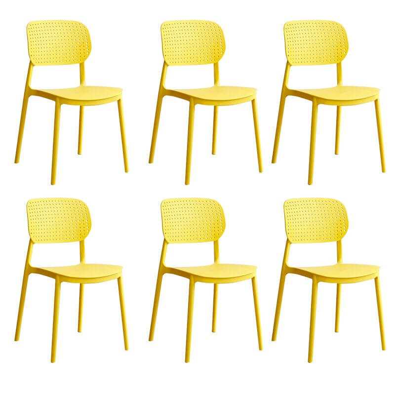 Stackable Scandinavian style plastic and acrylic side chair with low back for dining