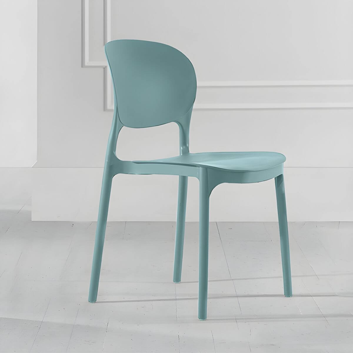 Stackable modern side chair with low back made of plastic and acrylic, perfect for contemporary dining
