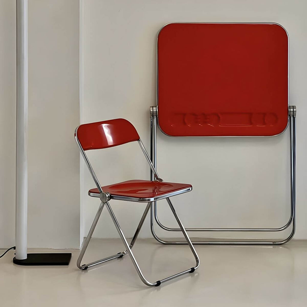 Contemporary acrylic folding armless chair with open back, ideal for dining rooms main product image