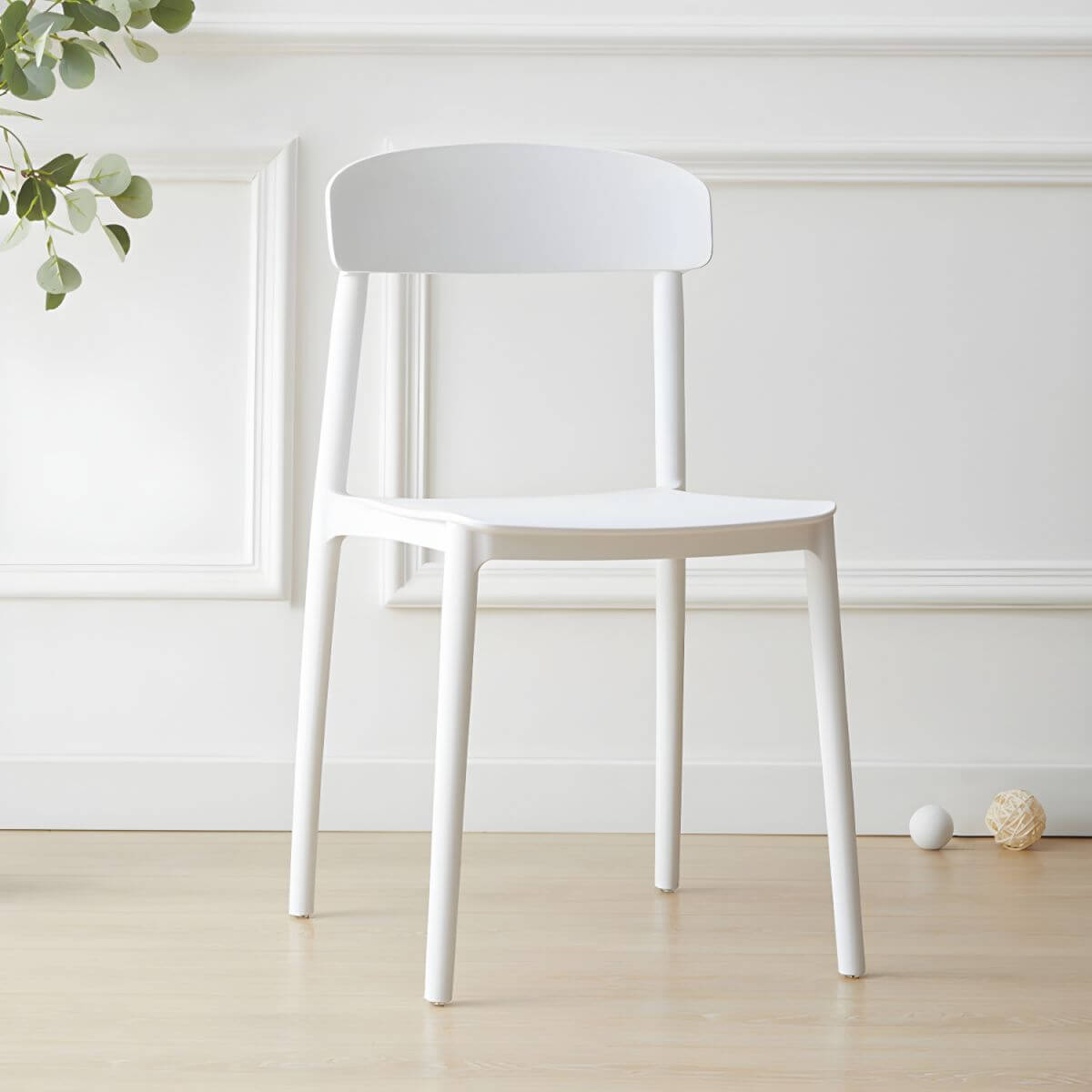 Scandinavian style low back kitchen and dining chair made of plastic and acrylic