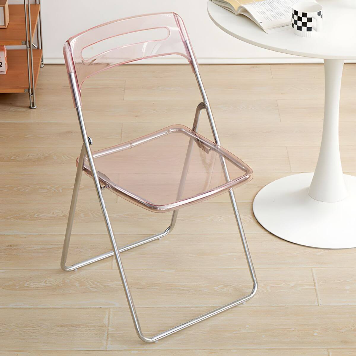 Modern collapsible open back side chair made of plastic and acrylic, ideal for kitchen and dining areas