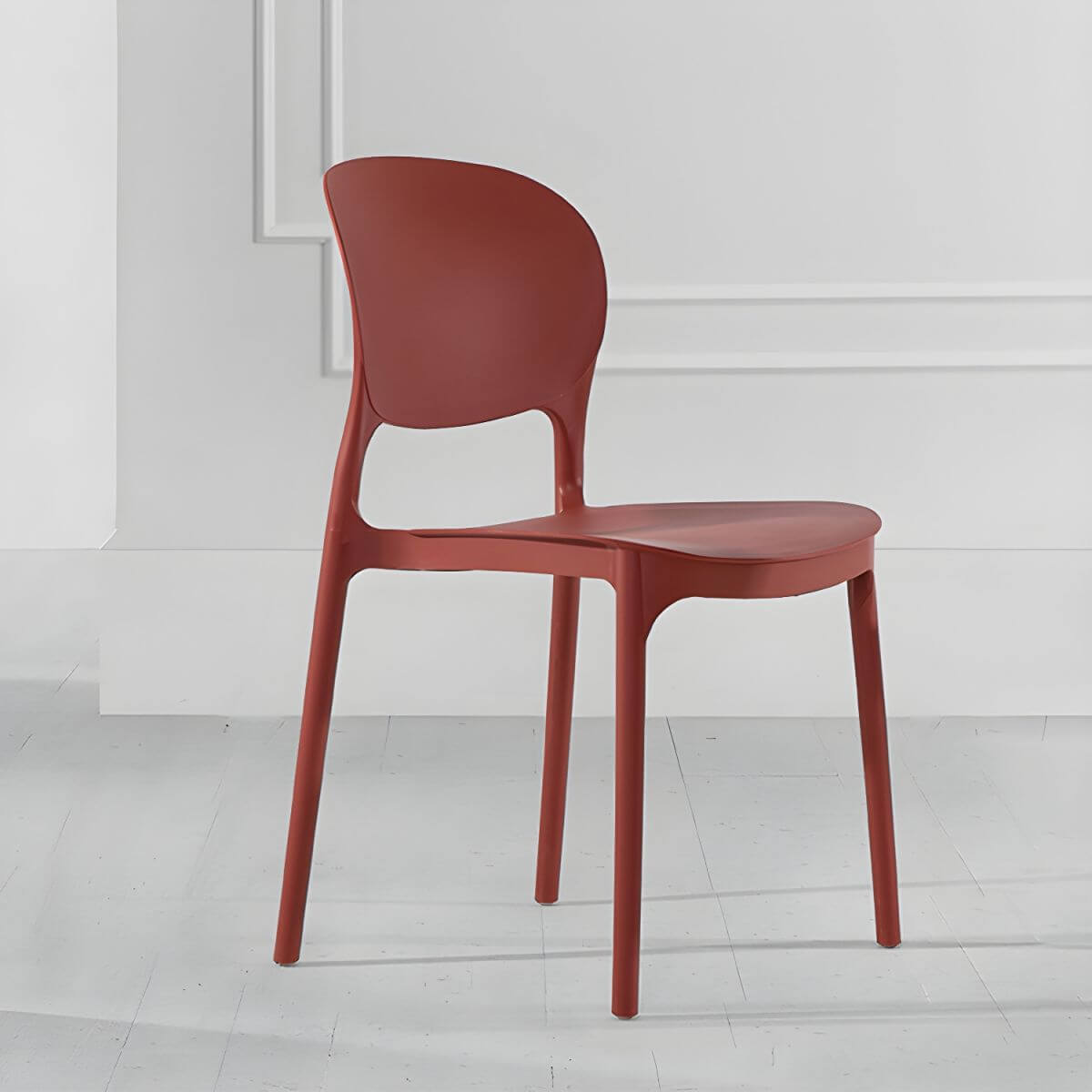 Stackable modern side chair with low back made of plastic and acrylic, perfect for contemporary dining