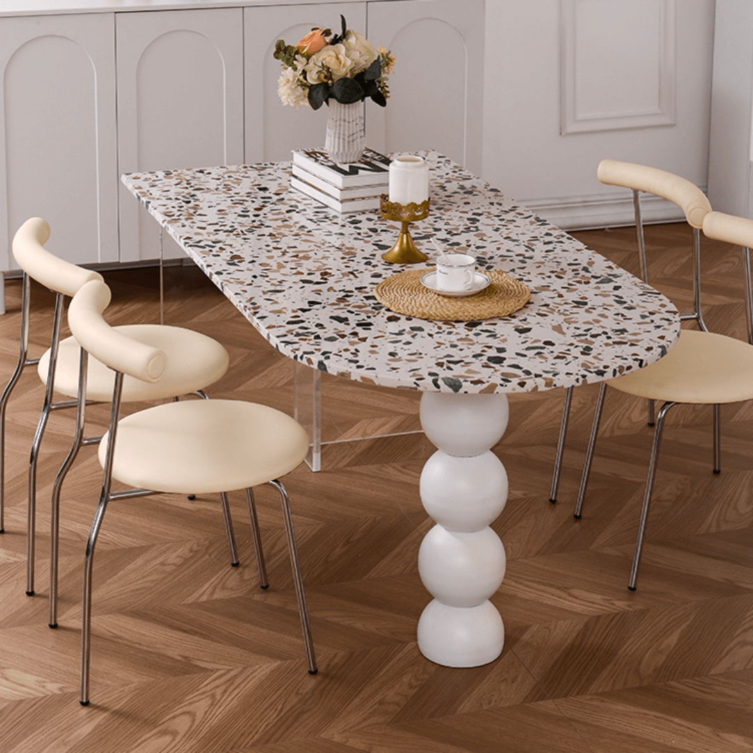 Half-elliptical terrazzo dining table with multicolor mosaic design, durable and stylish