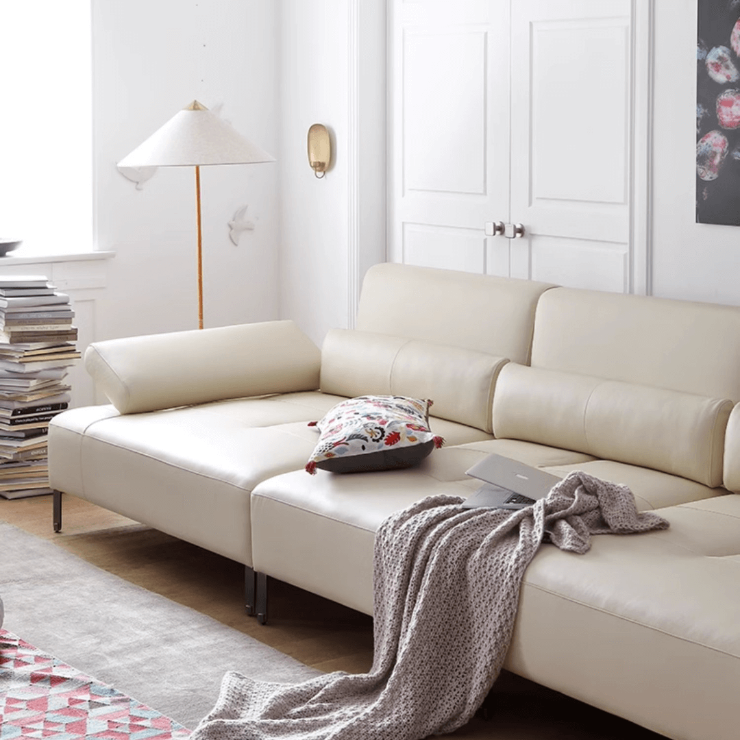 Cream white ergonomic sofa with transformable comfort and contemporary design