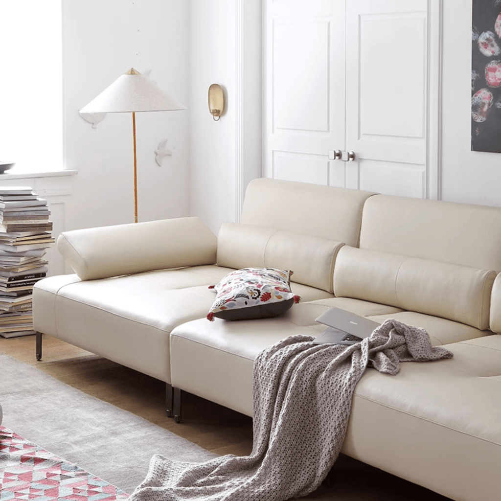 Cream white ergonomic sofa with transformable comfort and contemporary design