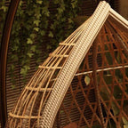 Auburn tropical alloy porch swing with stand, cushions, and chain for outdoor comfort