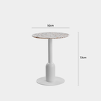 Round terrazzo table ideal for dining or office use with versatile design