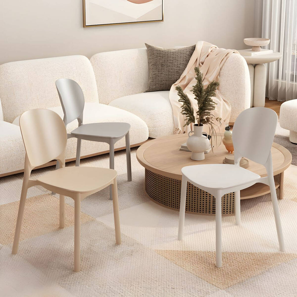 Stackable Scandinavian side chair with open back made of plastic and acrylic for dining