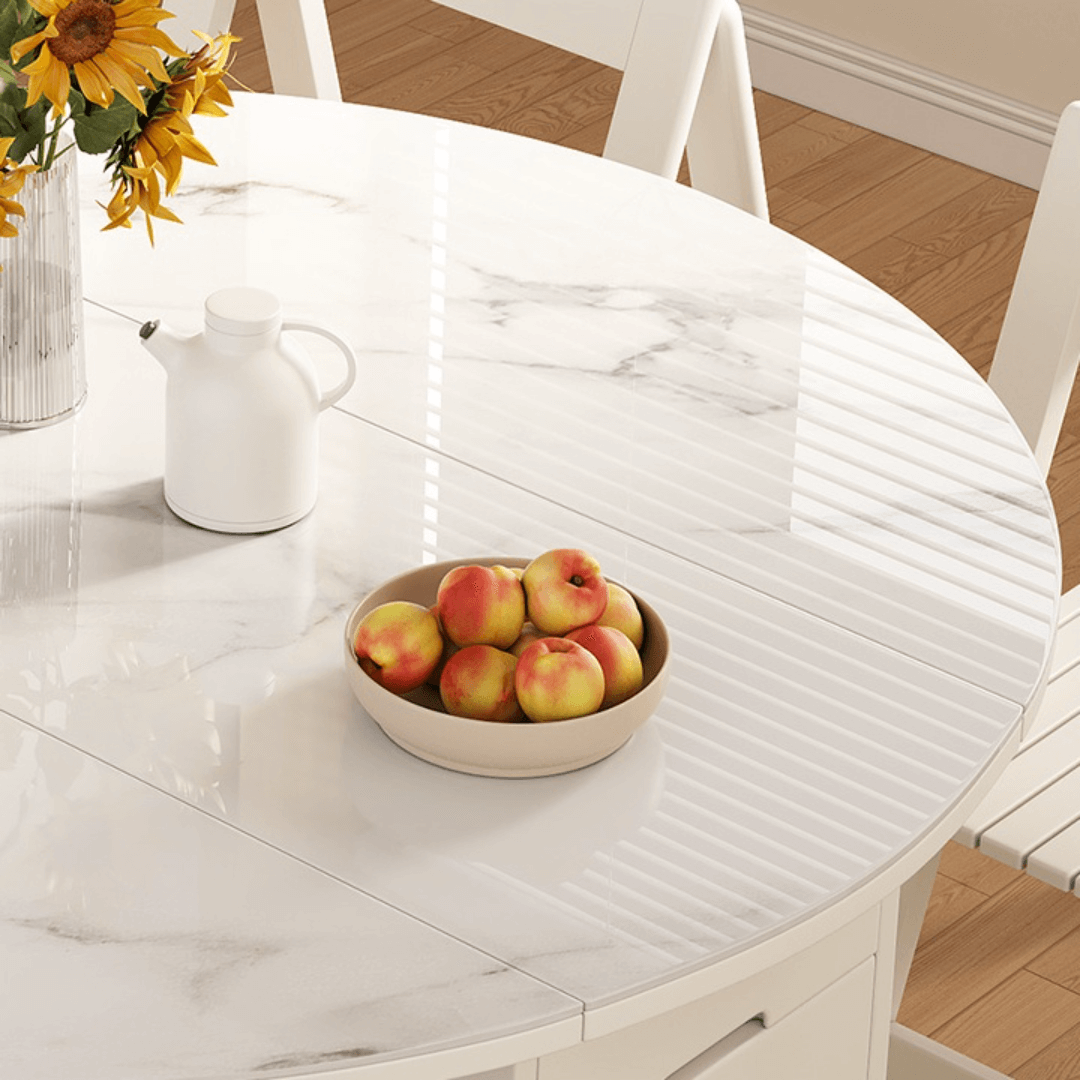 Round folding dining table with marble texture, perfect for small homes and space-saving design