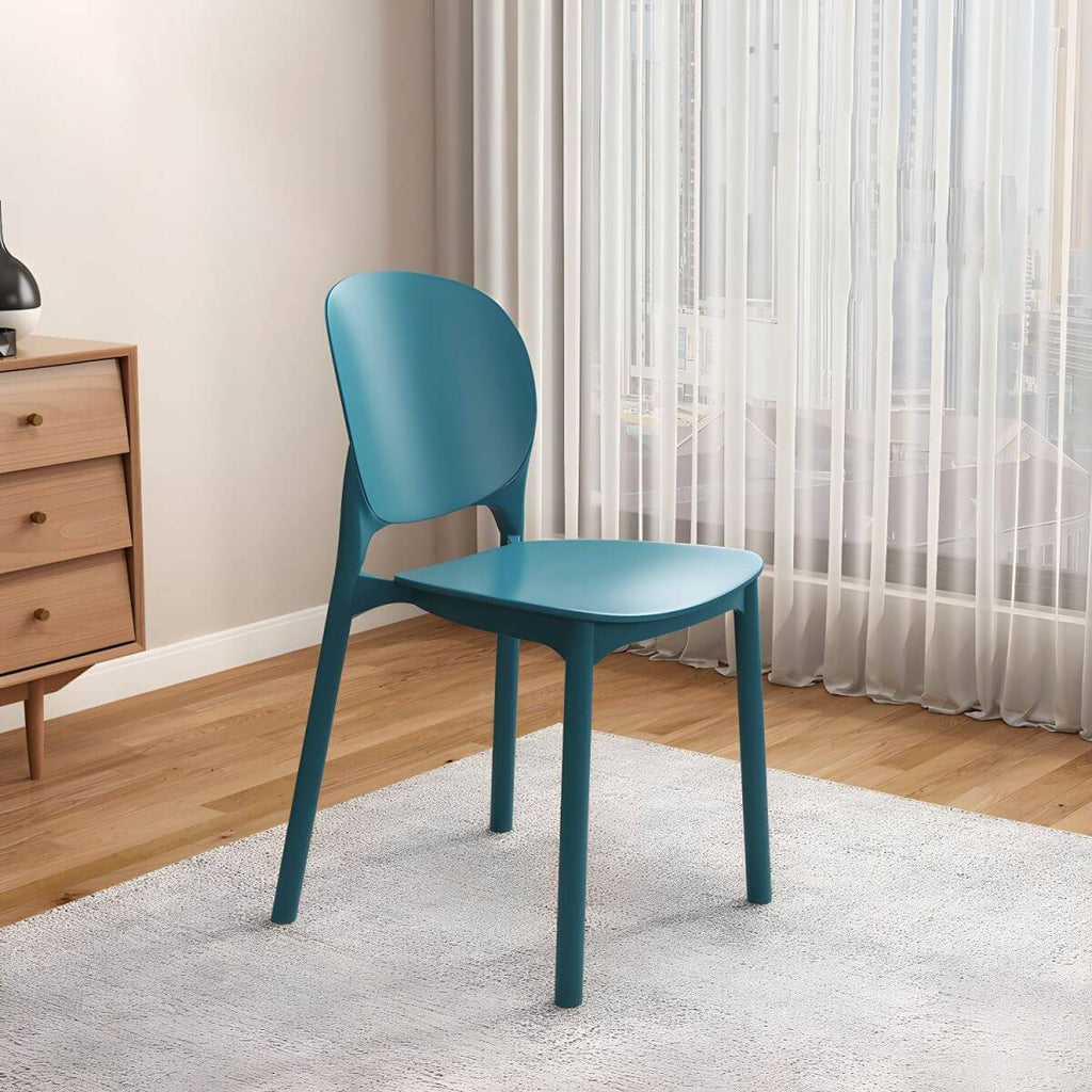 Stackable Scandinavian side chair with open back made of plastic and acrylic for dining