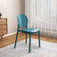 Stackable Scandinavian side chair with open back made of plastic and acrylic for dining