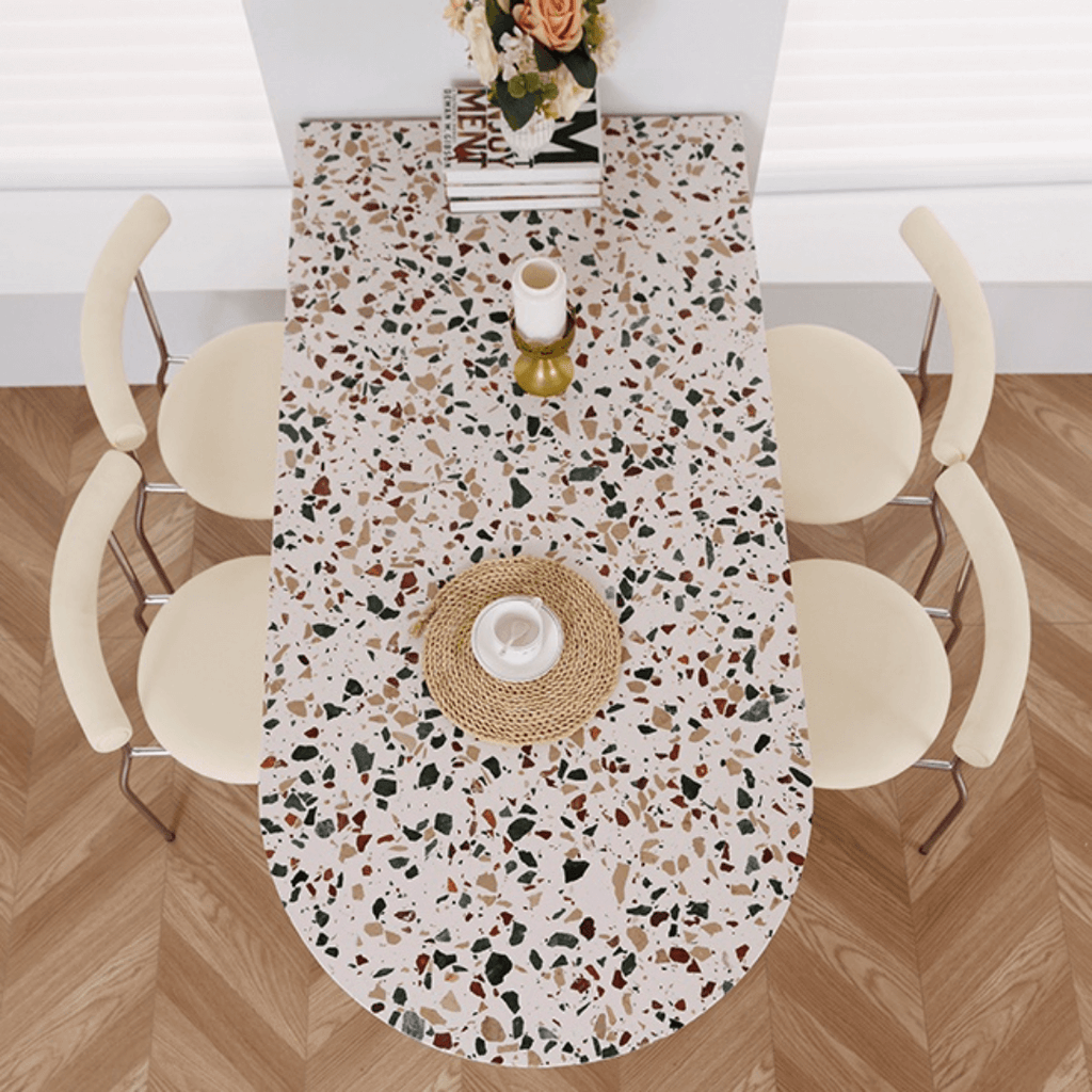 Half-elliptical terrazzo dining table with multicolor mosaic design, durable and stylish