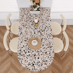 Half-elliptical terrazzo dining table with multicolor mosaic design, durable and stylish