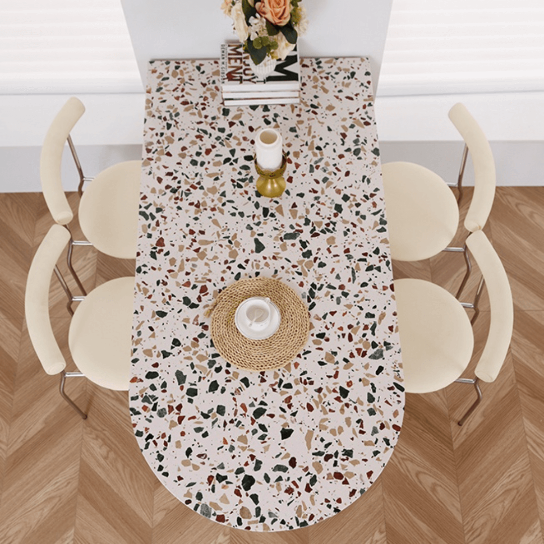 Half-elliptical terrazzo dining table with multicolor mosaic design, durable and stylish