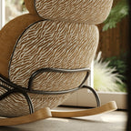 Chestnut Brown Sculptural Rocking Accent Chair With Ash Wood Base and Plush Wool