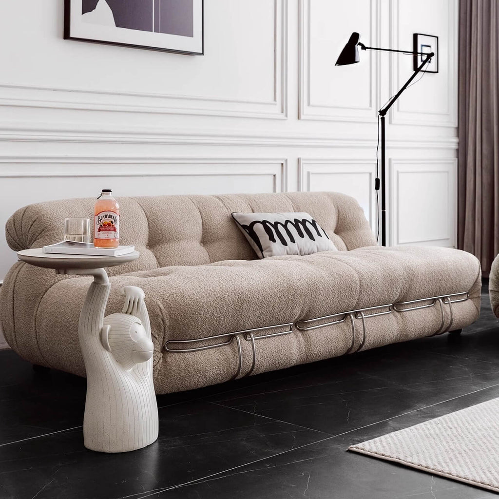 Beige boucle armless sofa with stainless steel frame, stylish and modern design