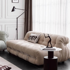 Fashionable beige sofa in boucle fabric with armless design and steel frame