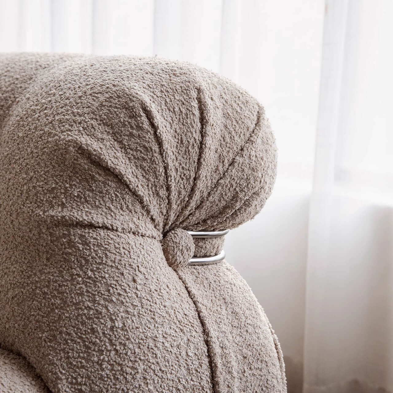 Beige boucle armless sofa with stainless steel frame, stylish and modern design