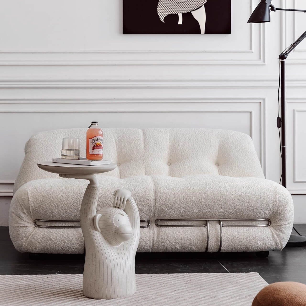 Beige boucle armless sofa with stainless steel frame, stylish and modern design