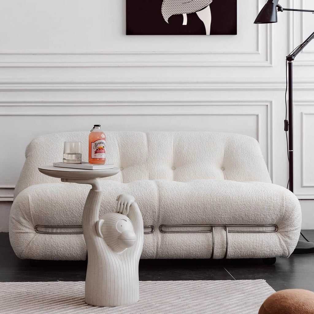 Beige boucle armless sofa with stainless steel frame, stylish and modern design