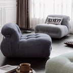 Beige boucle armless sofa with stainless steel frame, stylish and modern design