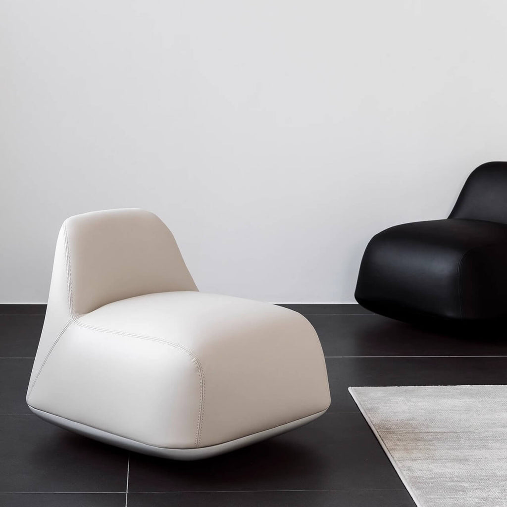 White microfiber leather tumbler sofa with a chic, cute armless design for modern living rooms main product image