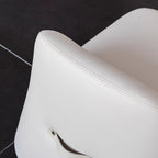 White microfiber leather tumbler sofa with a chic, cute armless design for modern living rooms