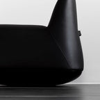 White microfiber leather tumbler sofa with a chic, cute armless design for modern living rooms