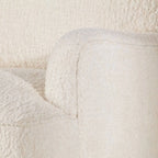Cream Boucle Fringe Chair with Sculpted Arms for Boutique Corners