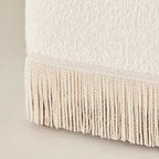 Cream Boucle Fringe Chair with Sculpted Arms for Boutique Corners