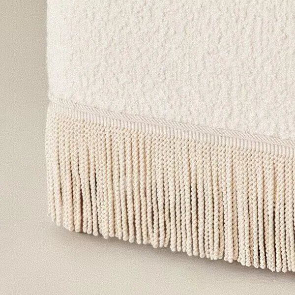 Cream Boucle Fringe Chair with Sculpted Arms for Boutique Corners